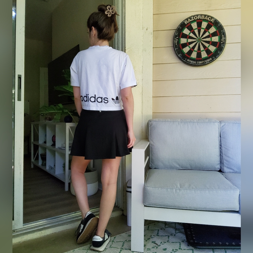 Sleek Black Mini Skirt with Modern Flair